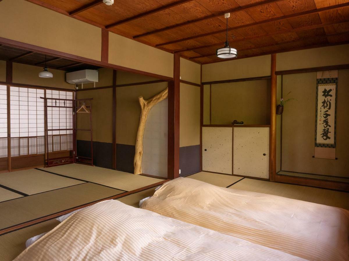 Kyoto Machiya Cottage Karigane Exterior photo